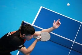 man playing table Tennis 
